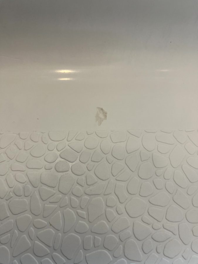 Before shower pan surface repair