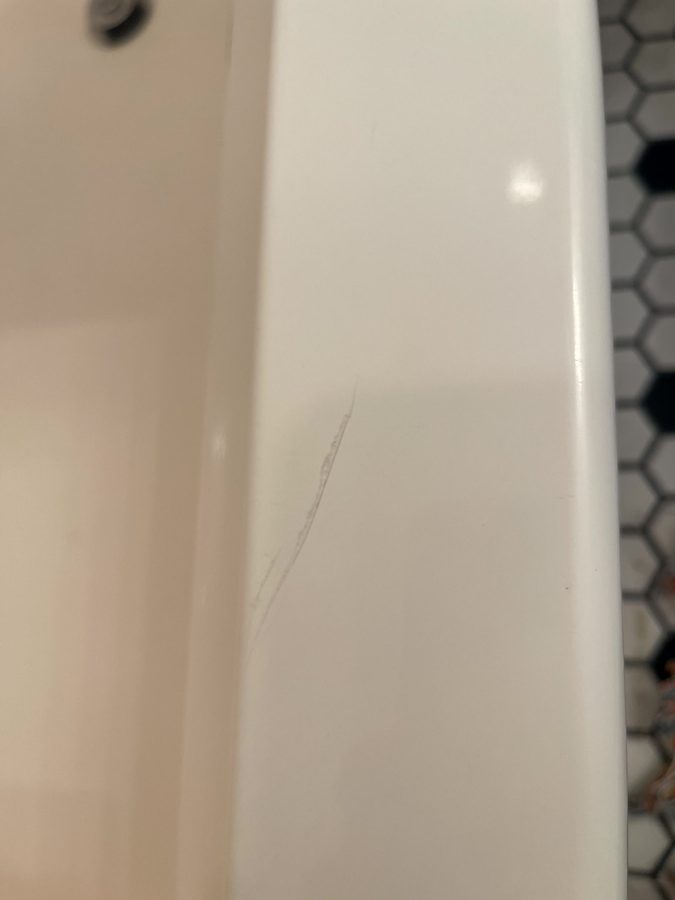 Before tub edge repair